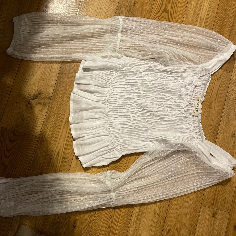 Small white top with see through puffy sleeves